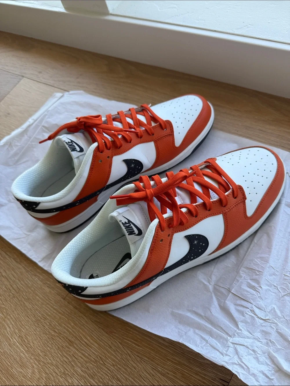Nike Dunk Low-Top Sneakers in White, Orange & Black.